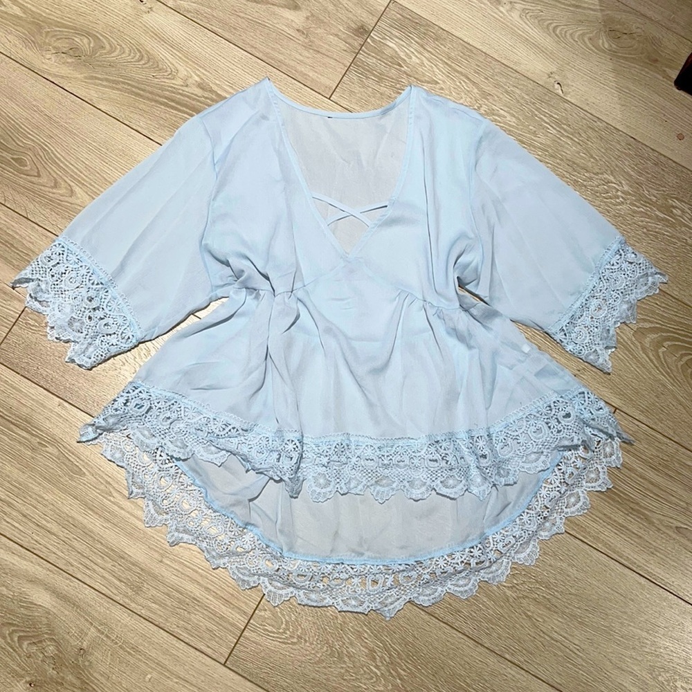 Really cute high-low baby blue blouse
